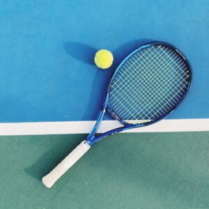 white and blue tennis racket